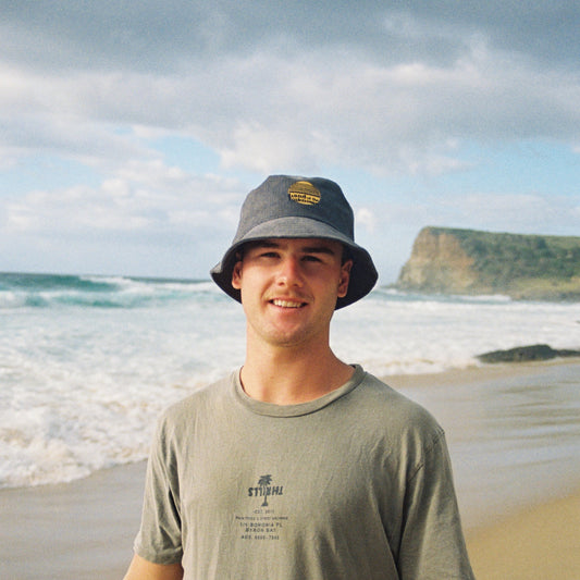Corduroy bucket hat in charcoal grey colour.