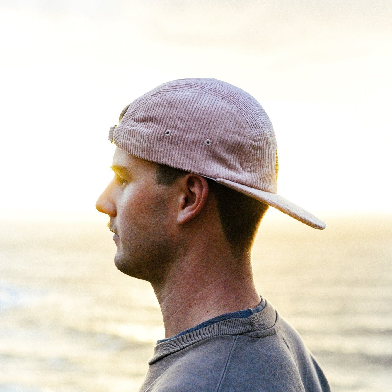 5 panel corduroy hat in salmon pink colour.