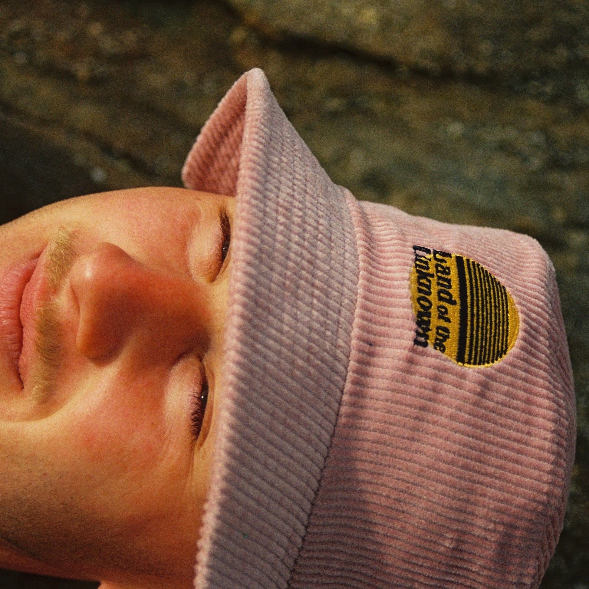 Corduroy bucket hat in salmon pink colour.